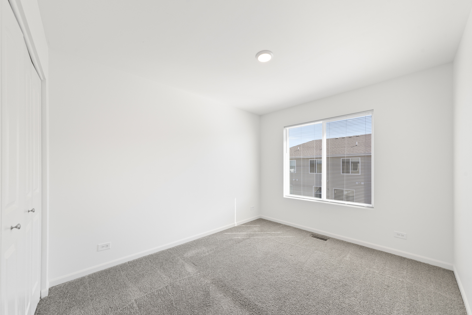 2307 Upland Road Pingree Grove, IL 60140 - Photo 13 of 30 an empty room with a window