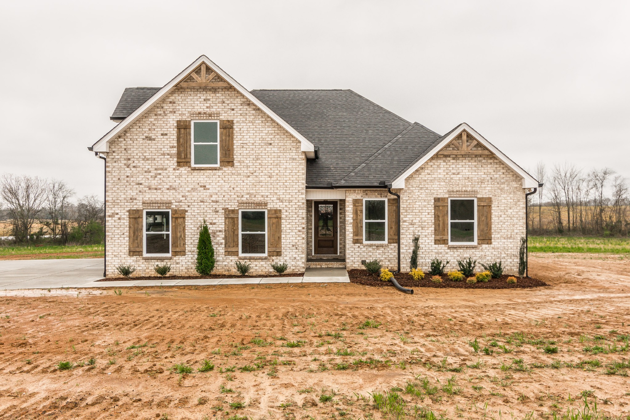 1227 Friendship Road Cross Plains, TN 37049 - Photo 1 of 28 a front view of a house with a yard