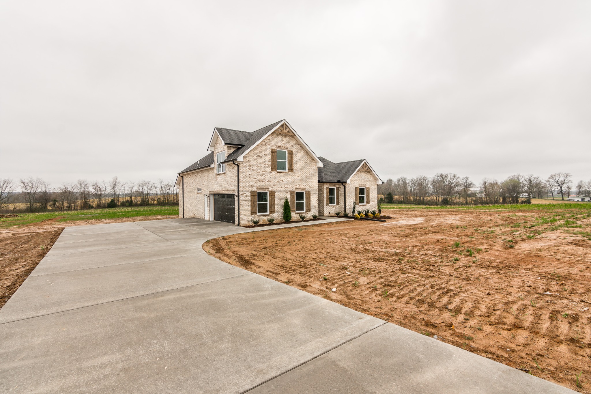 1227 Friendship Road Cross Plains, TN 37049 - Photo 2 of 28 a view of a house with a yard