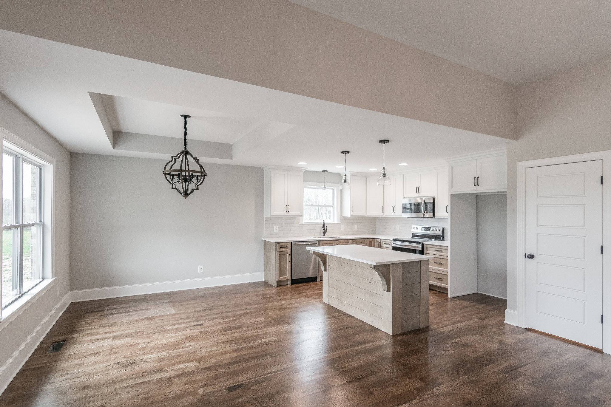 1227 Friendship Road Cross Plains, TN 37049 - Photo 11 of 28 a kitchen with kitchen island a sink stainless steel appliances and cabinets