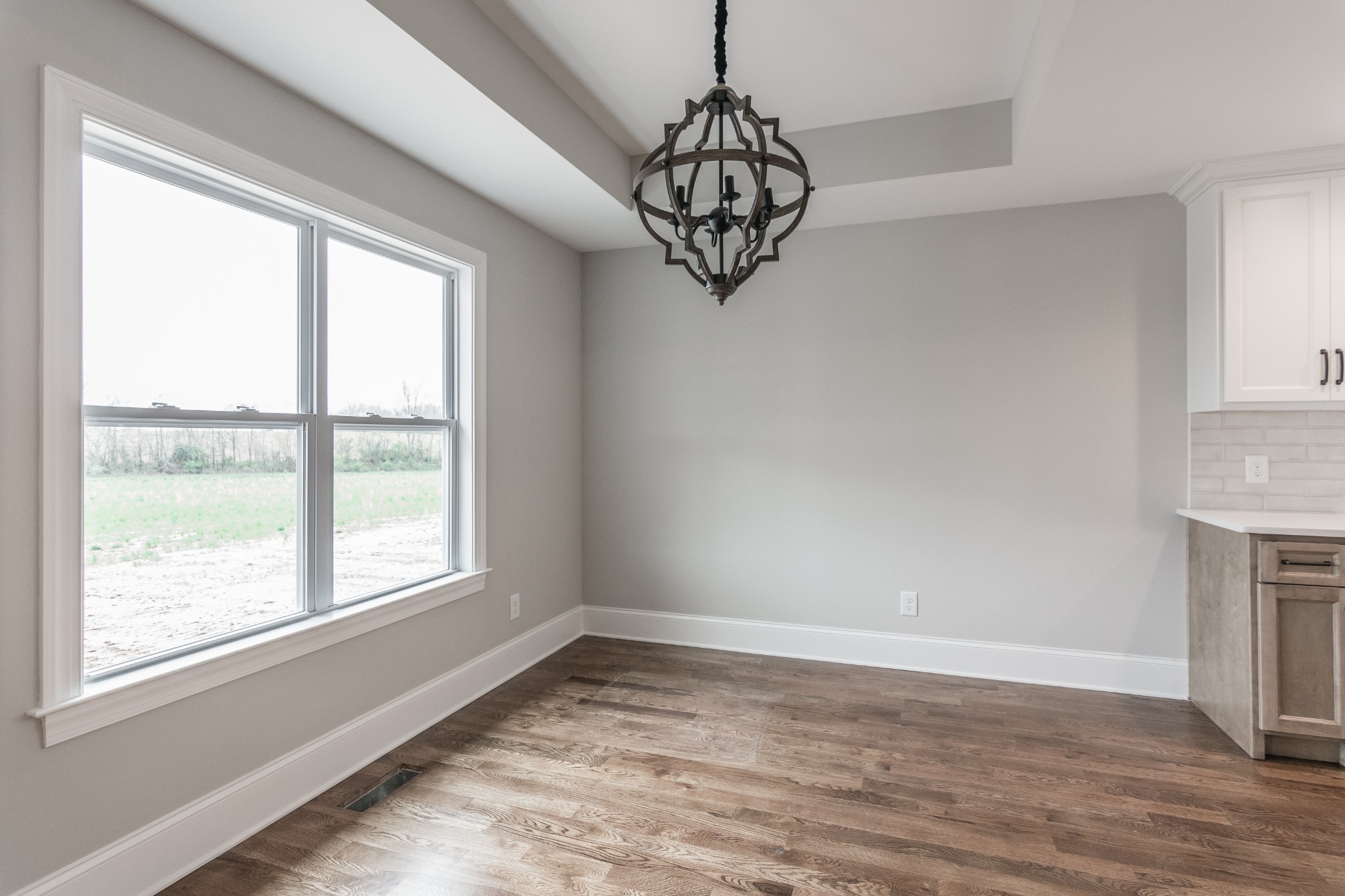 1227 Friendship Road Cross Plains, TN 37049 - Photo 14 of 28 a view of a room with window and wooden floor