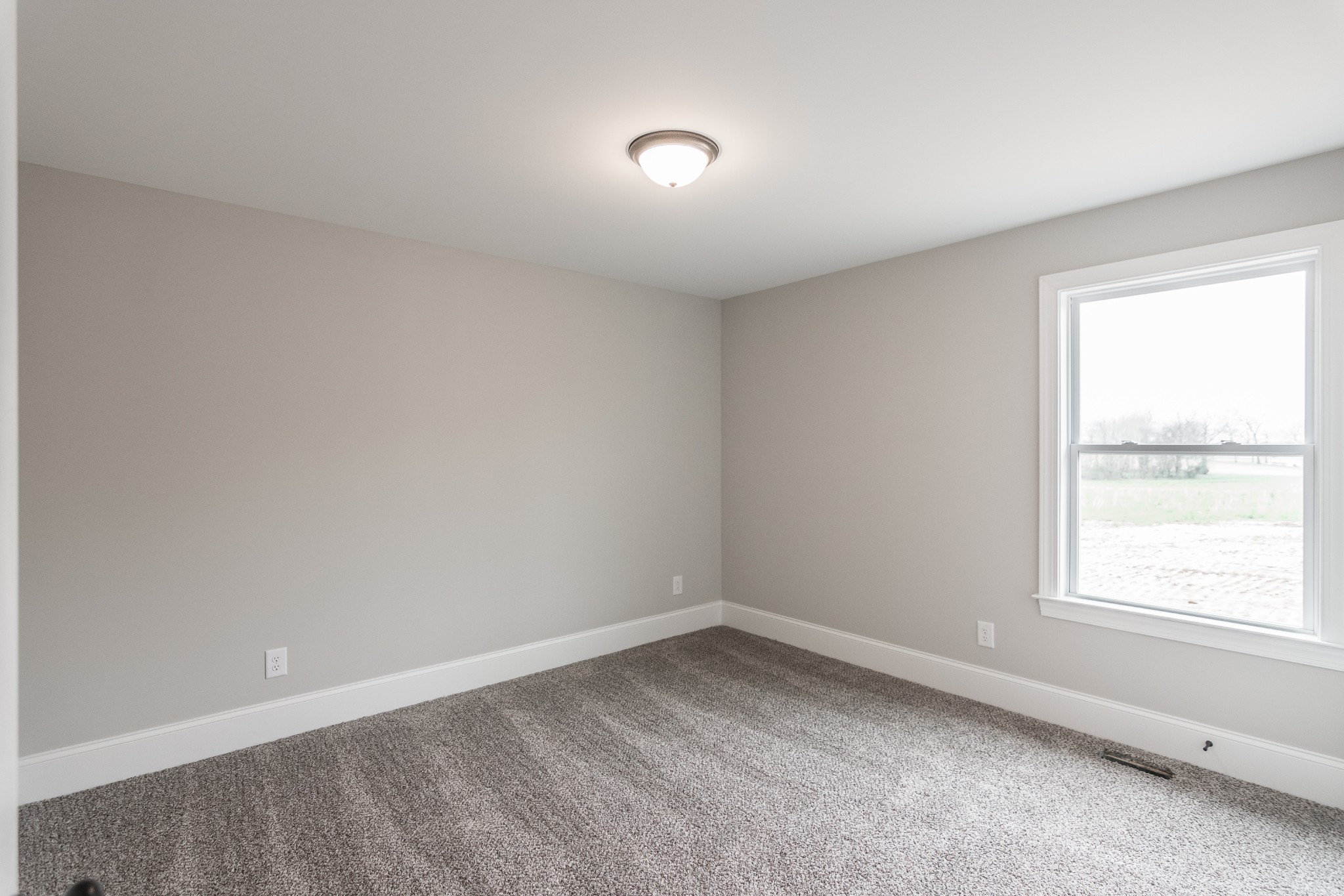1227 Friendship Road Cross Plains, TN 37049 - Photo 26 of 28 an empty room with a window