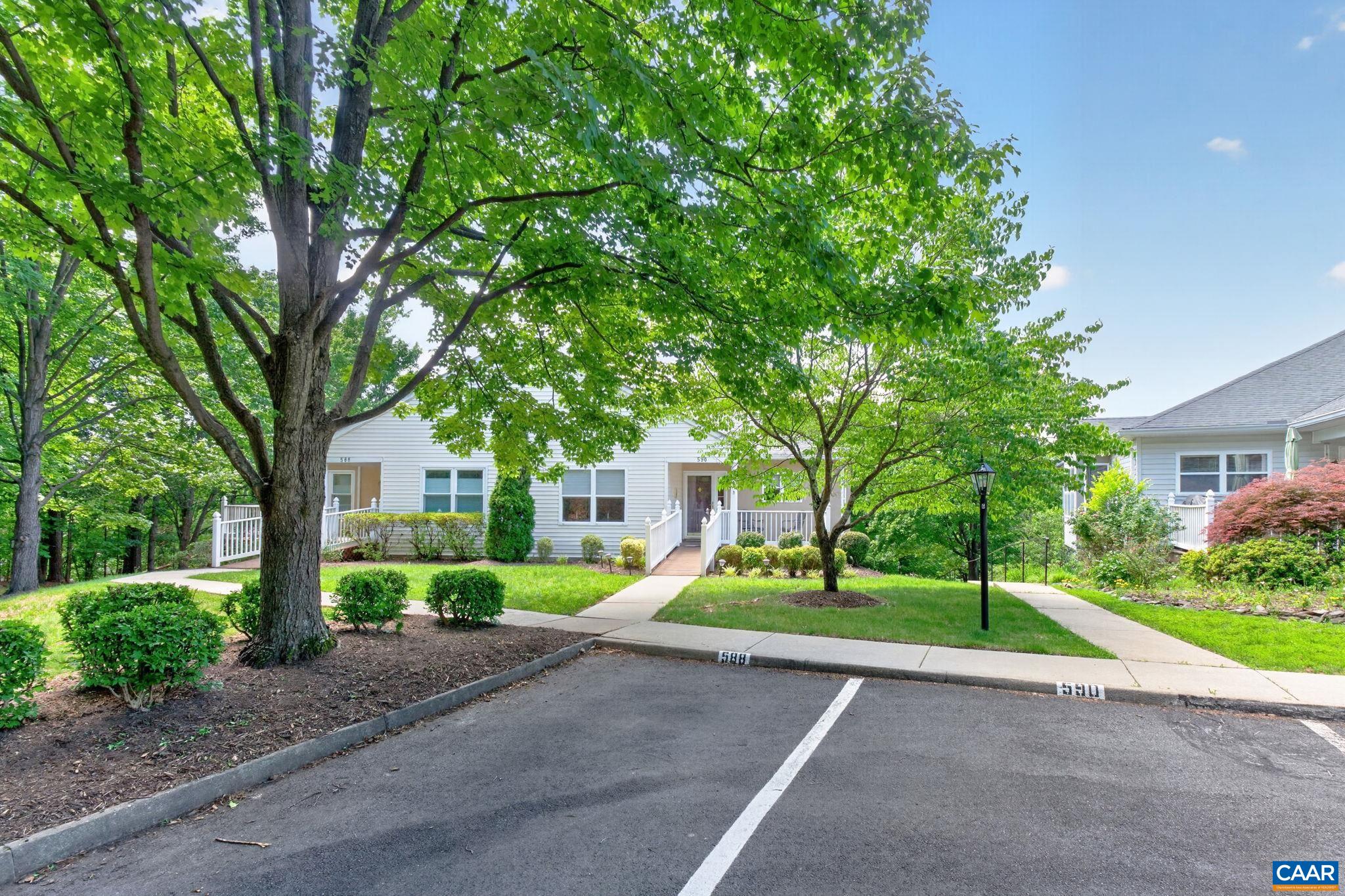 590 Mockingbird Way Charlottesville, VA 22901 - Photo 43 of 43 a front view of a house with a yard and garage