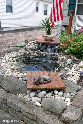 a front view of a house with parking space