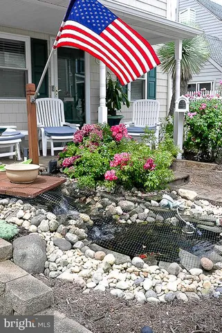 a view of a city street with tall buildings