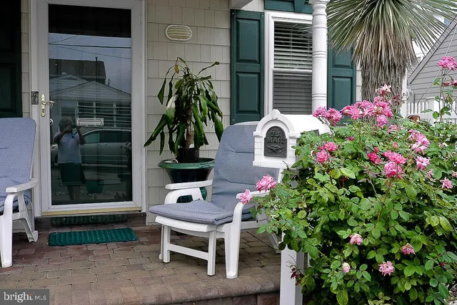 a kitchen with a refrigerator and a stove