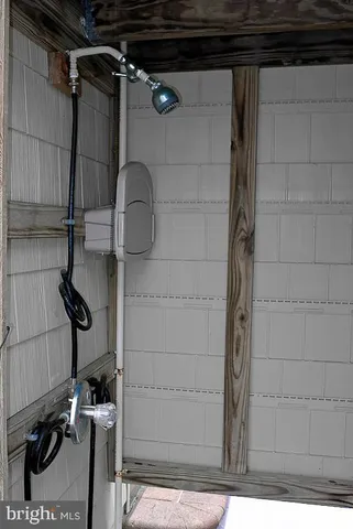a white toilet sitting next to a bathroom sink