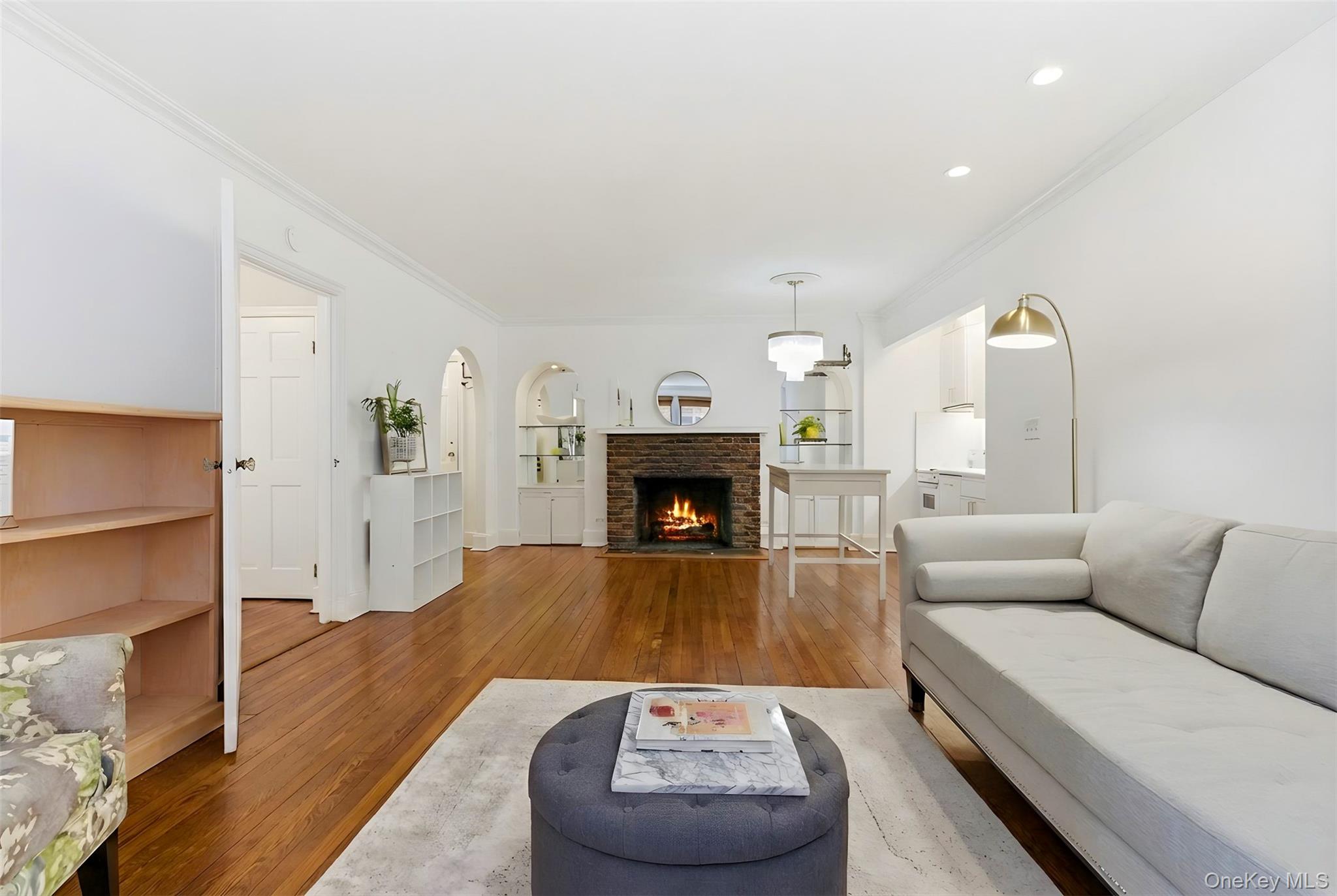 270 Bronxville Road, Unit B22 Bronxville, NY 10708 - Photo 11 of 23 living room open to fireplace