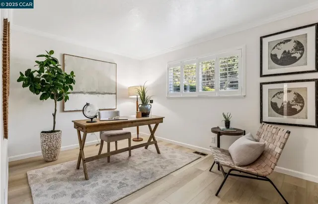 a workspace with furniture and window