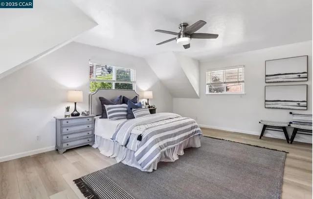 a bed room with a bed and a window