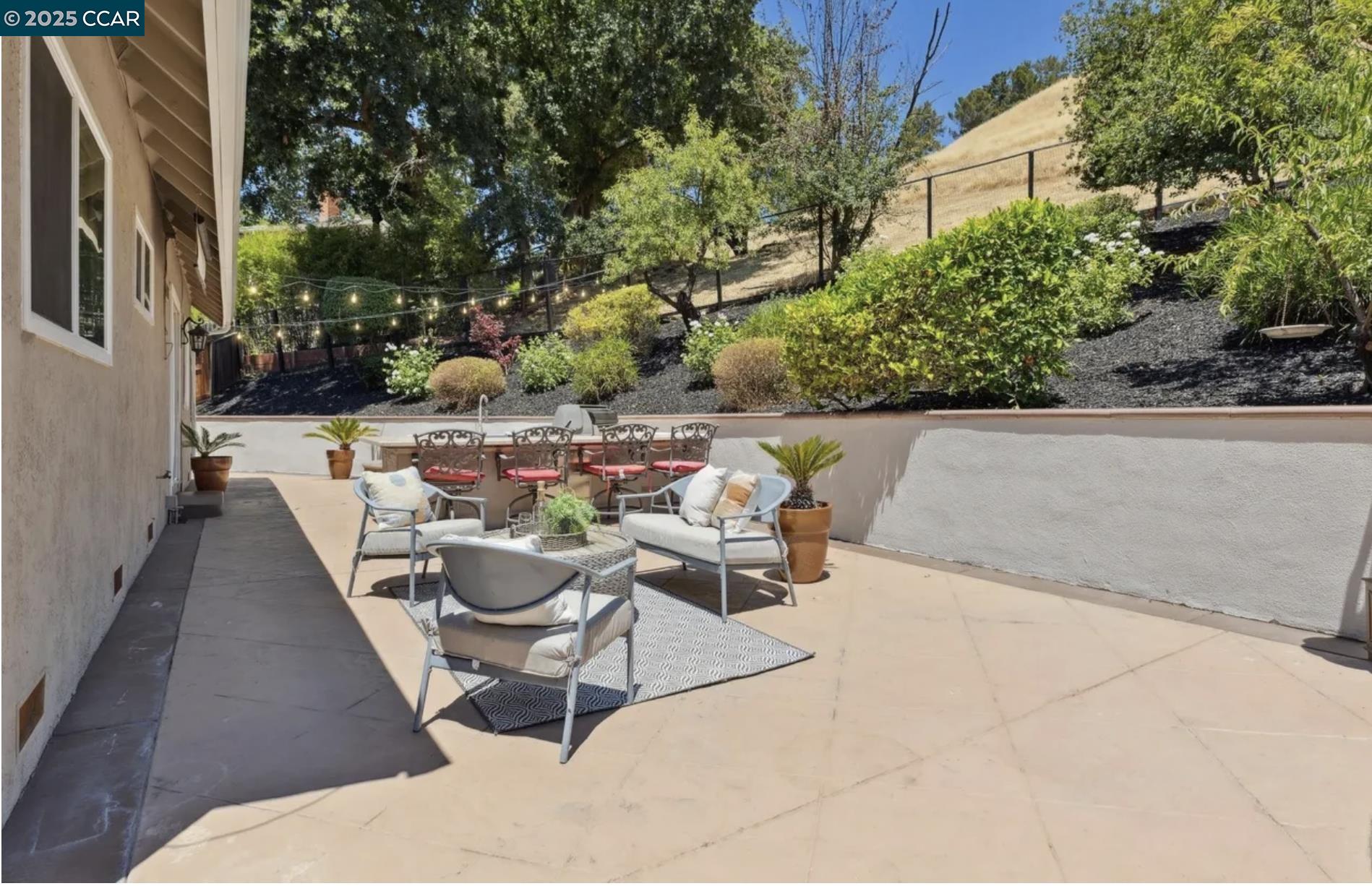 1600 Springbrook Road Walnut Creek, CA 94597 - Photo 19 of 20 a view of a patio with couches and potted plants