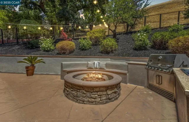 a view of a swimming pool with a yard