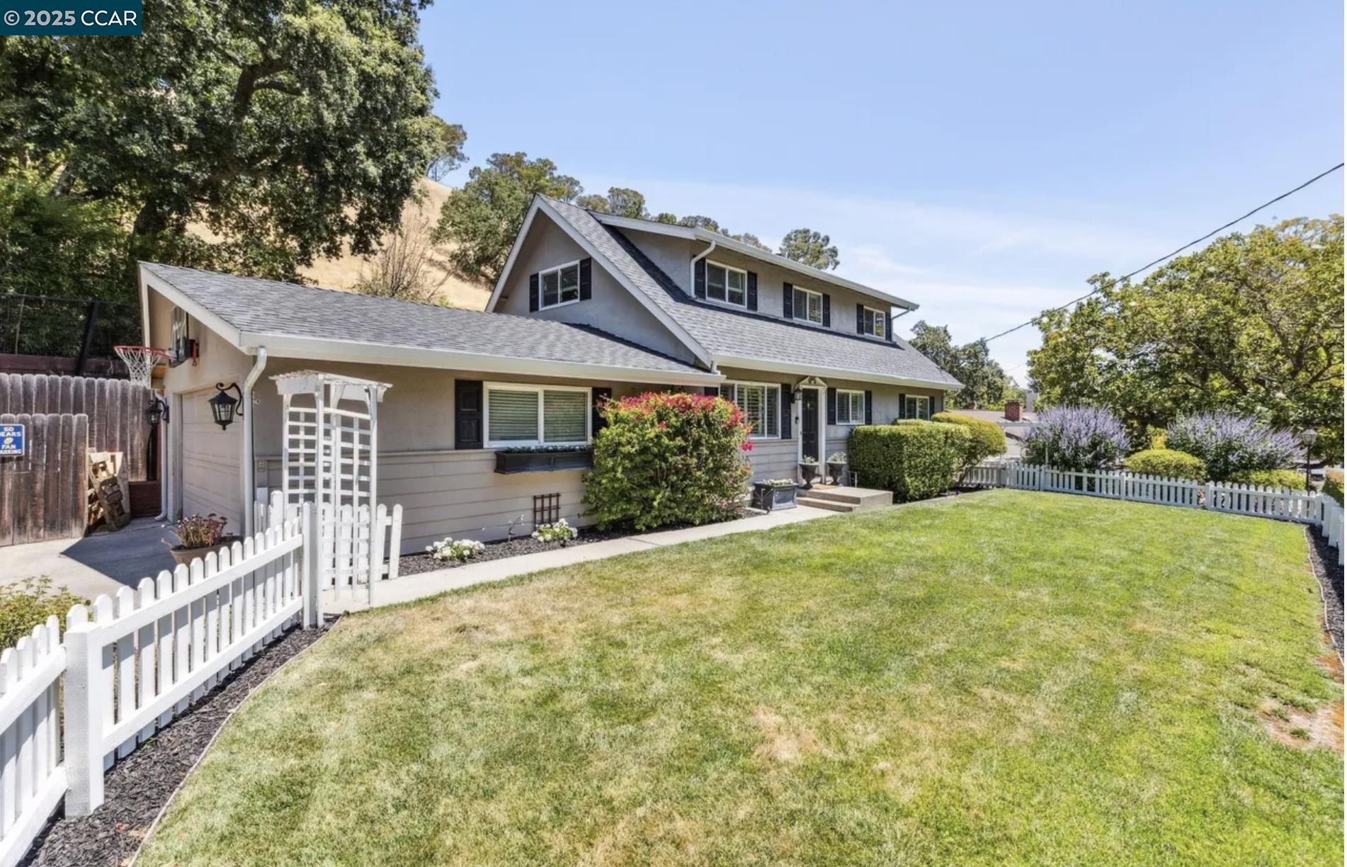 1600 Springbrook Road Walnut Creek, CA 94597 - Photo 2 of 20 a front view of a house with a yard