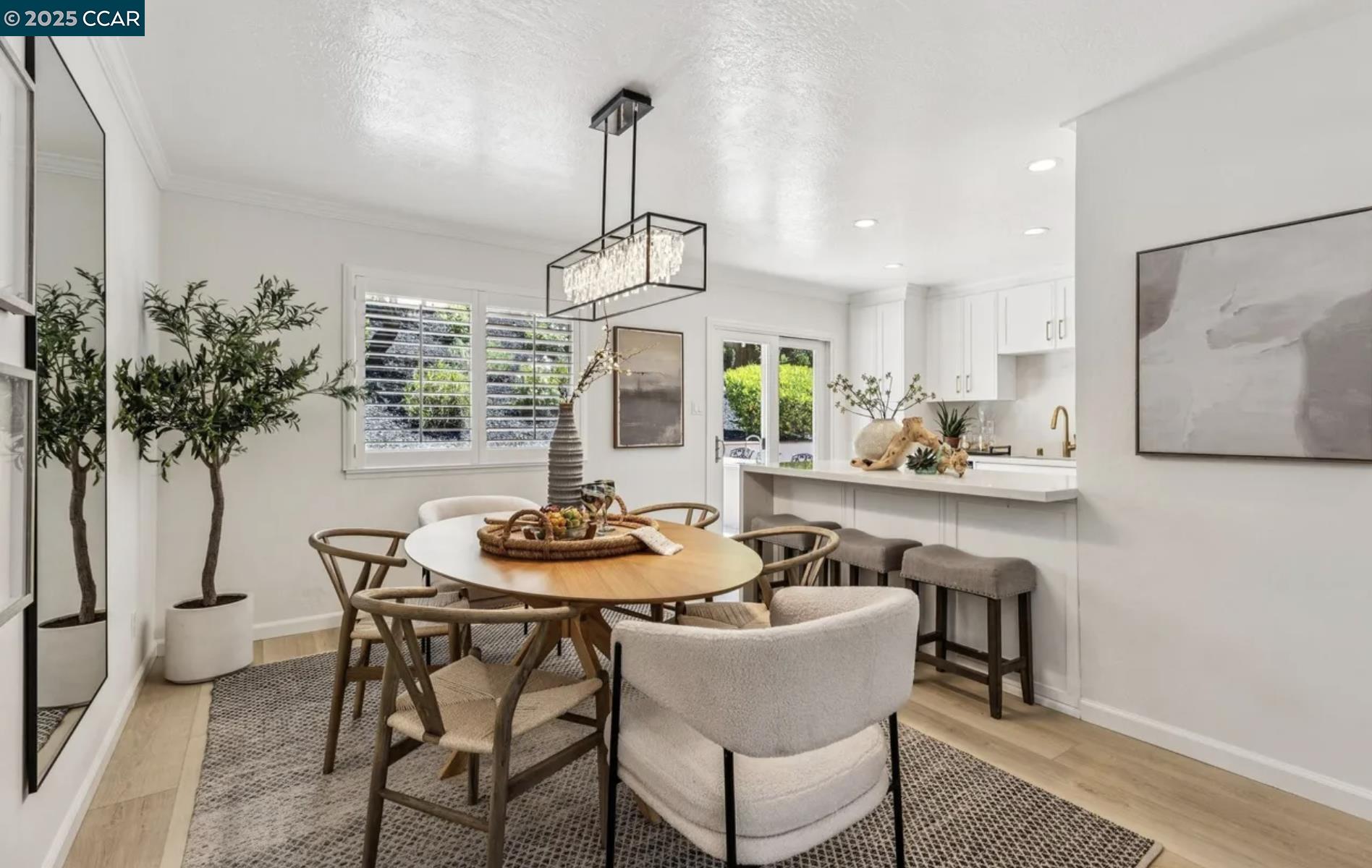 1600 Springbrook Road Walnut Creek, CA 94597 - Photo 7 of 20 a kitchen with a table and chairs in it