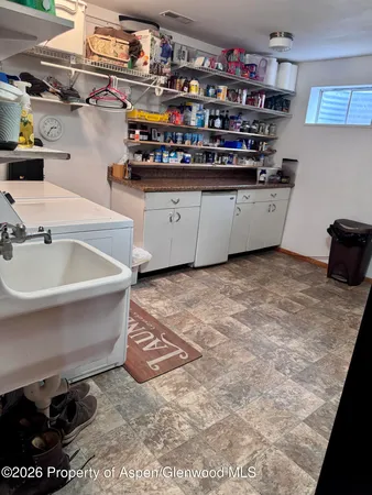 a room with storage and utility