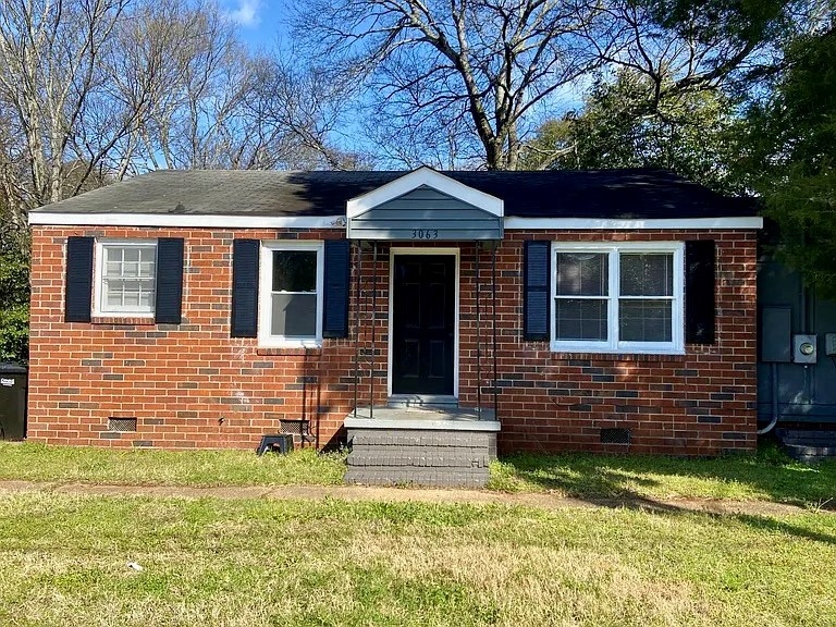 1035 Fisk Avenue Columbus, GA 31906 - Photo 4 of 23 a front view of a house with garden