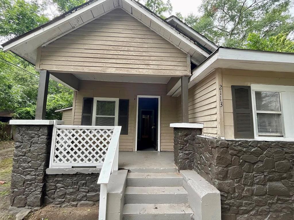 1035 Fisk Avenue Columbus, GA 31906 - Photo 9 of 23 a front view of a house with large windows