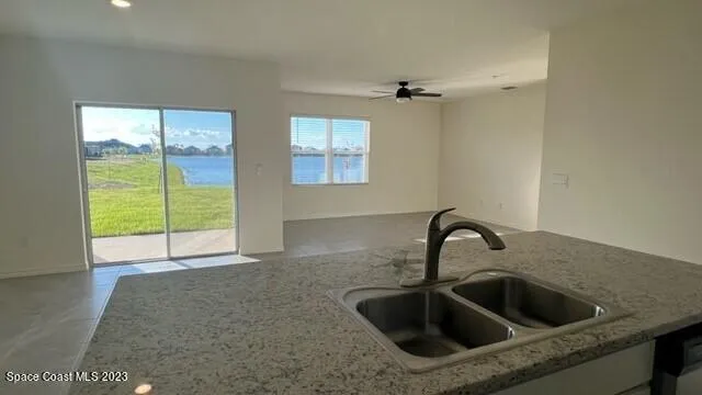 a kitchen with a sink and a window