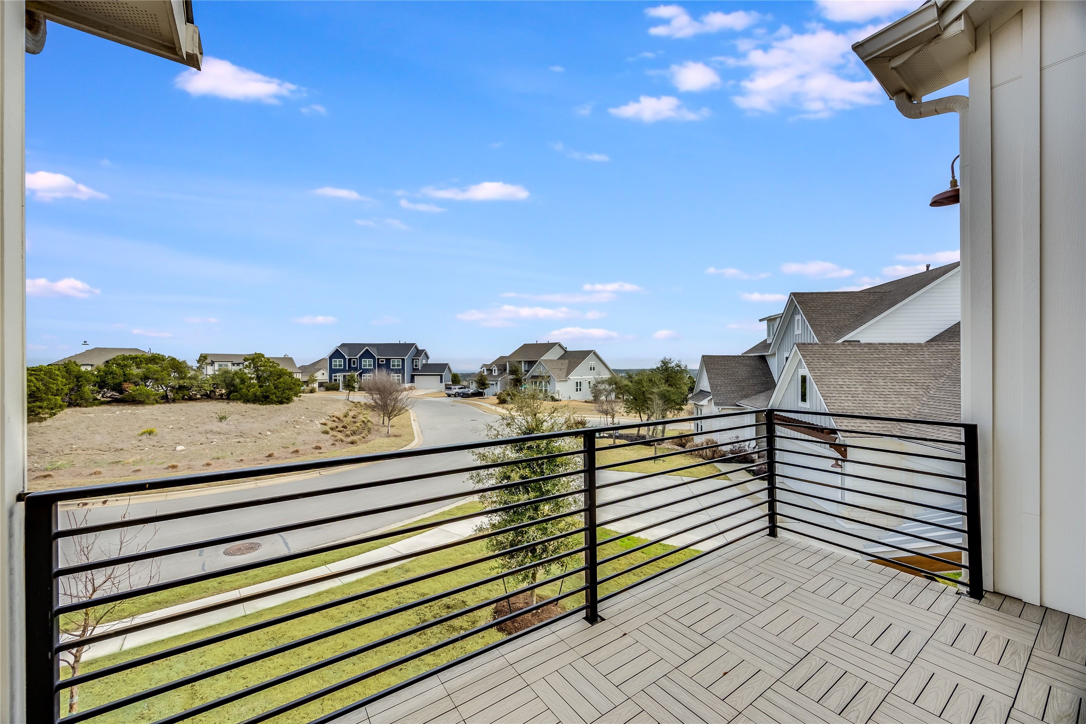 288 Smoke Tree Circle Dripping Springs, TX 78620 - Photo 25 of 40 a view of a terrace with a bench