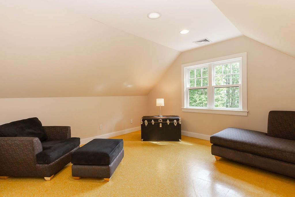 43 Beaver Pond Road Beverly, MA 01915 - Photo 24 of 33 a living room with furniture and a window