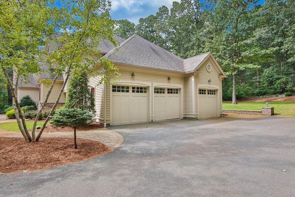 43 Beaver Pond Road Beverly, MA 01915 - Photo 25 of 33 a view of a house with a yard and large tree