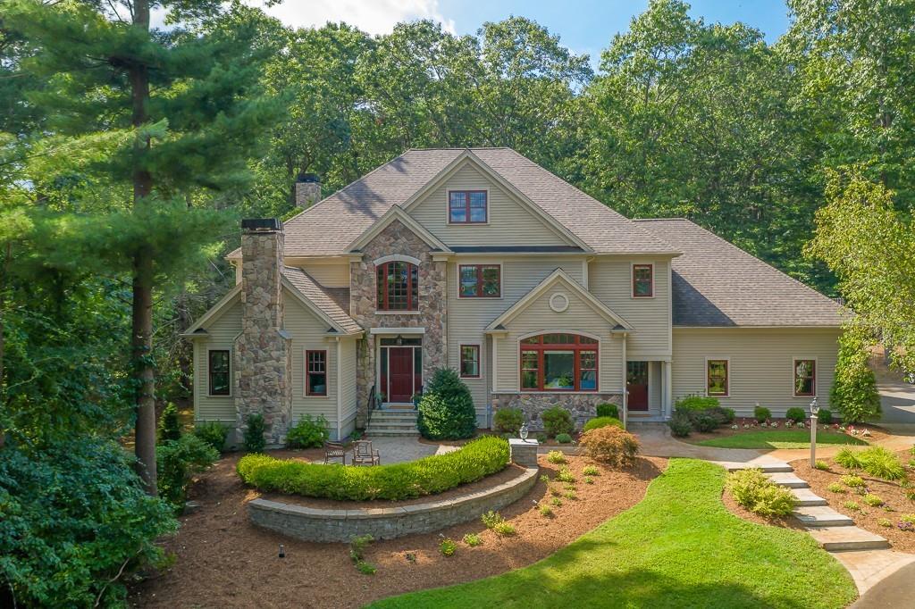 43 Beaver Pond Road Beverly, MA 01915 - Photo 33 of 33 a front view of a house with a garden and porch