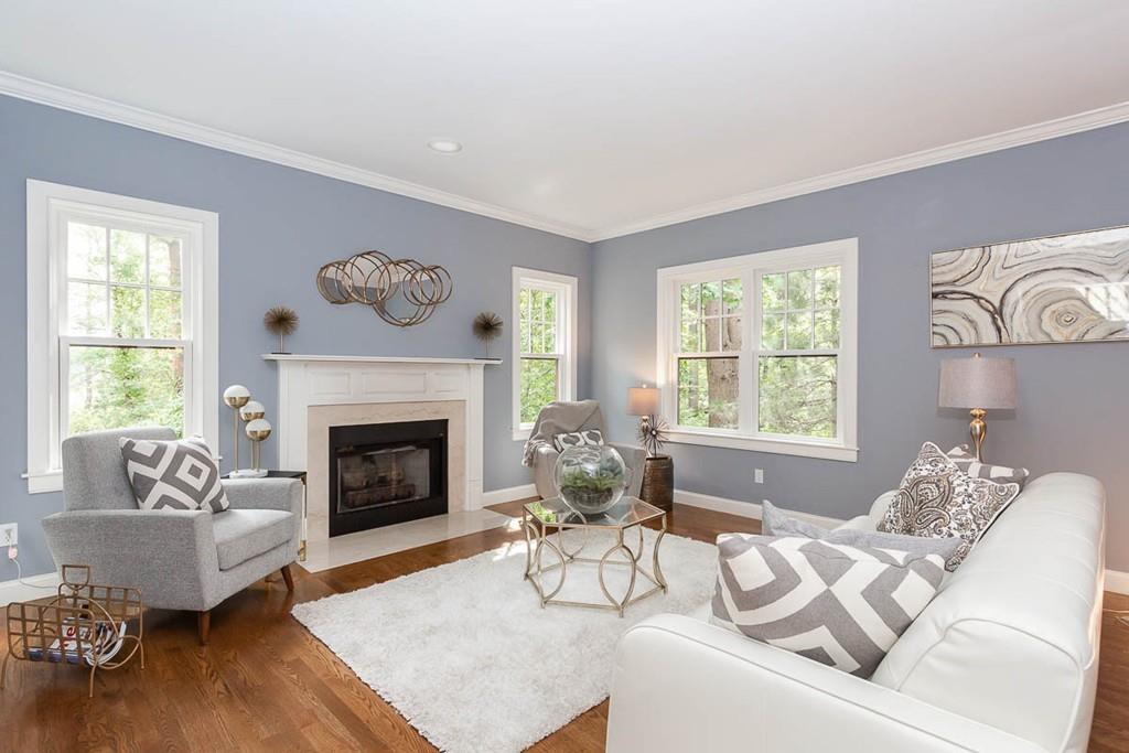 43 Beaver Pond Road Beverly, MA 01915 - Photo 4 of 33 a living room with furniture and a fireplace