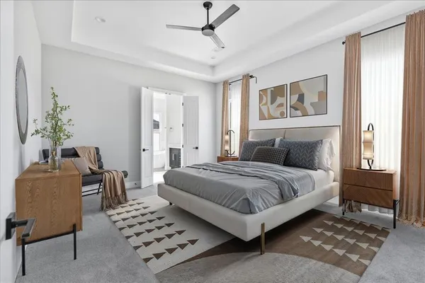 a bedroom with a bed and furniture