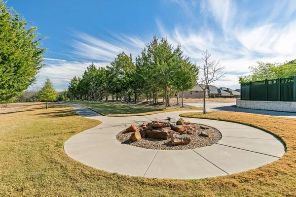 a view of a swimming pool with a sitting yard