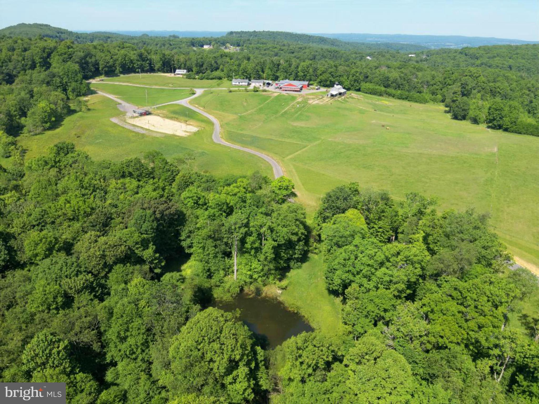 301 Dinkenberger Road Kingwood, WV 26537 - Photo 55 of 57 a view of a grassy area with an trees