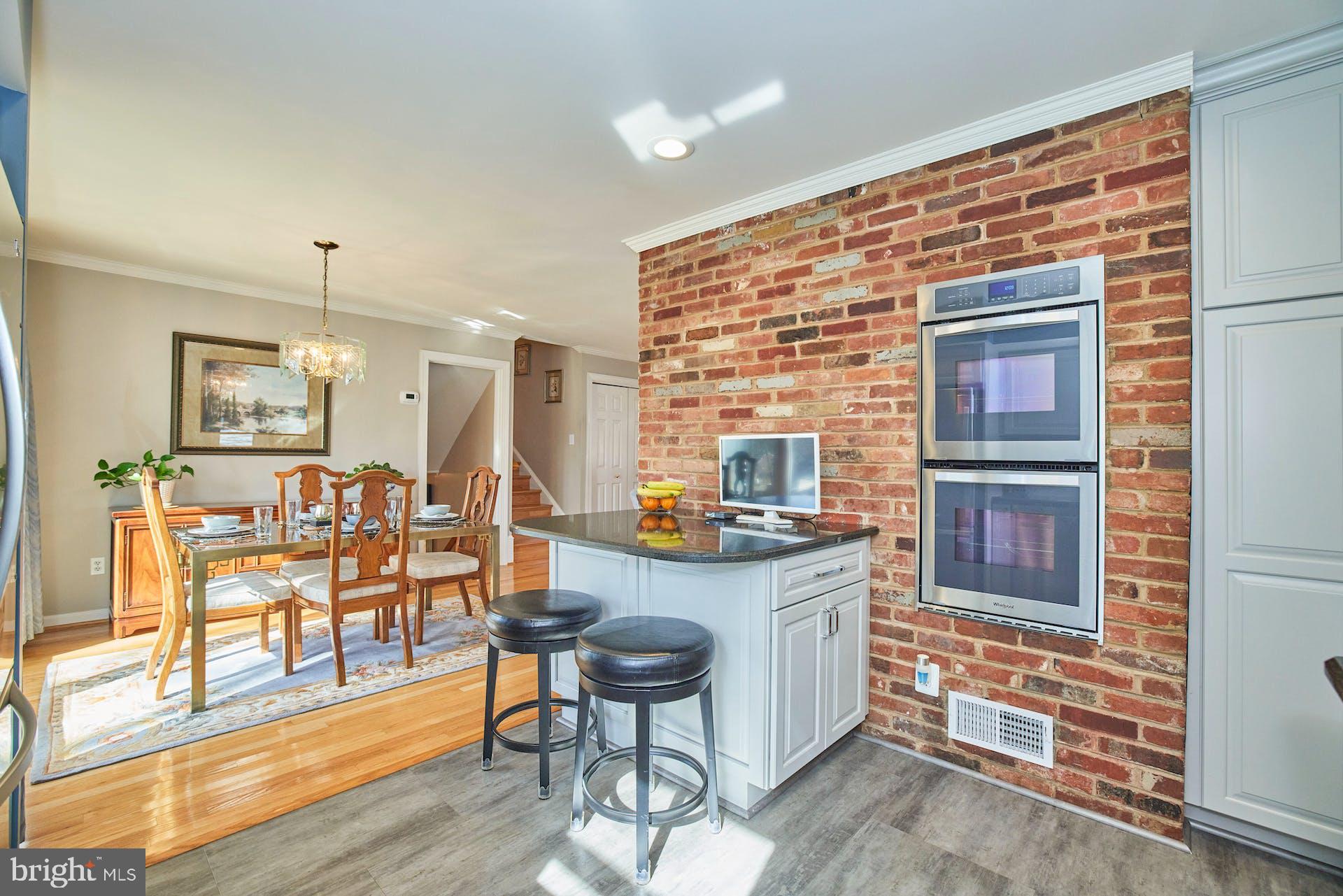 7613 Hamlet Street Springfield, VA 22151 - Photo 10 of 49 Kitchen with bar seating and double ovens