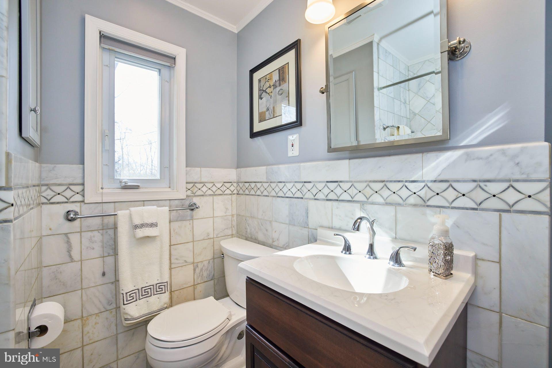 7613 Hamlet Street Springfield, VA 22151 - Photo 20 of 49 Updated bathroom with decorative tile