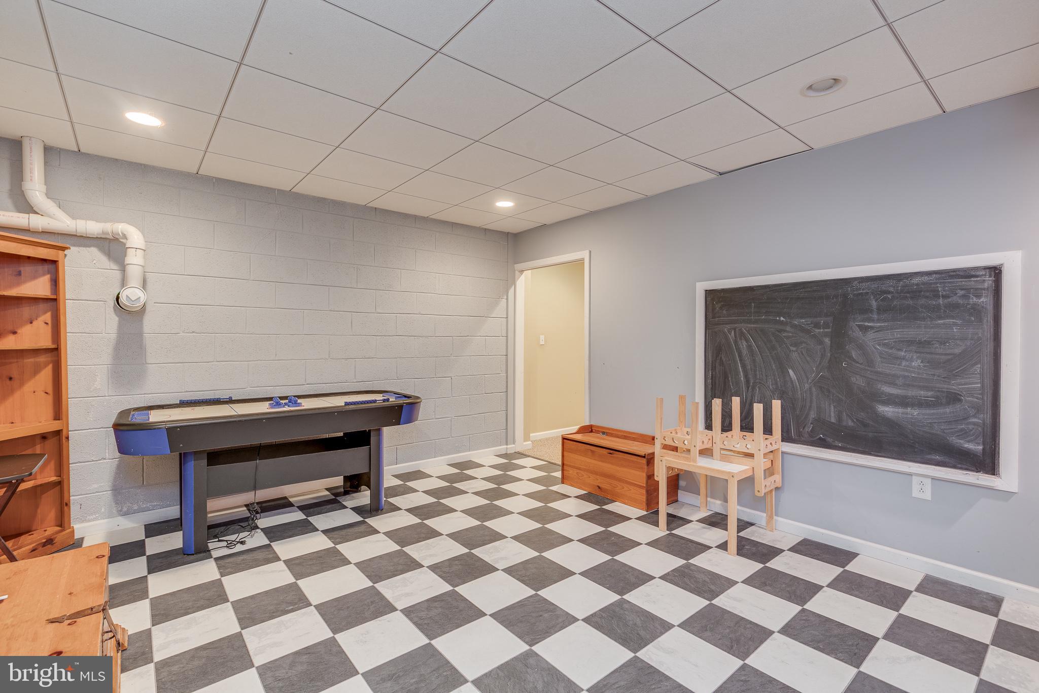 2 Dellaira Court Wrightstown, NJ 08562 - Photo 55 of 93 a room with a piano and wooden floor