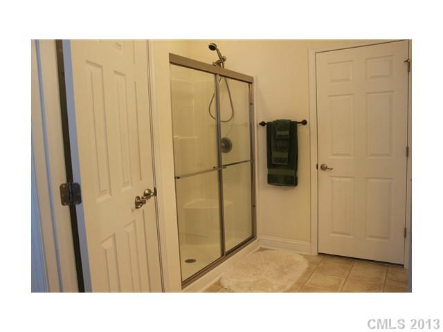 332 Garnet Court, Unit 528 Fort Mill, SC 29708 - Photo 11 of 16 a bathroom with a shower and a sink