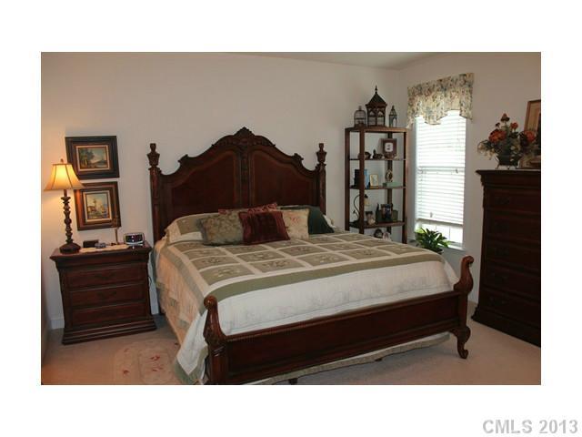 332 Garnet Court, Unit 528 Fort Mill, SC 29708 - Photo 10 of 16 a bedroom with a bed and a closet