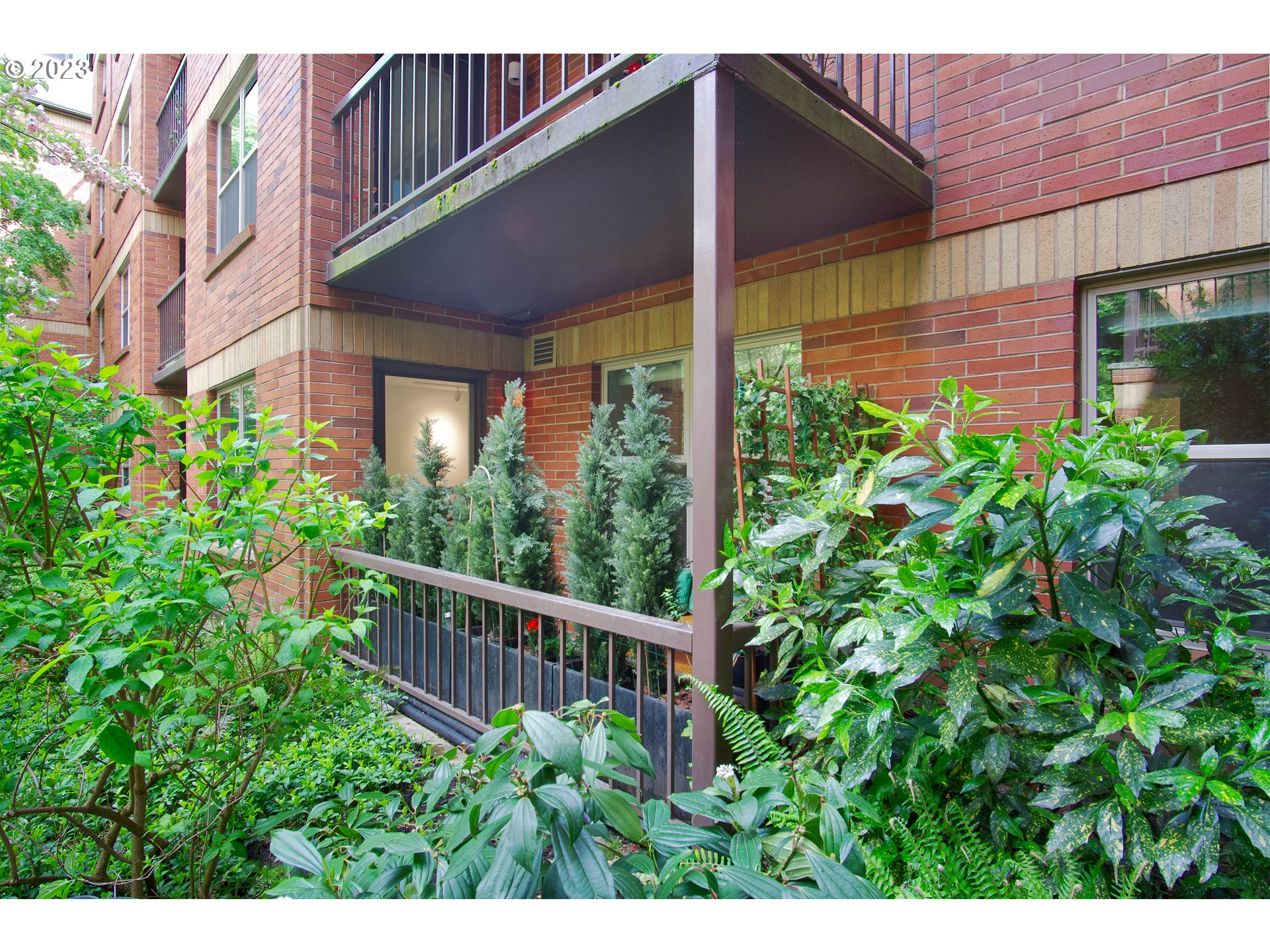 1500 Southwest Park Avenue, Unit 118 Portland, OR 97201 - Photo 16 of 30 a view of a house with brick walls