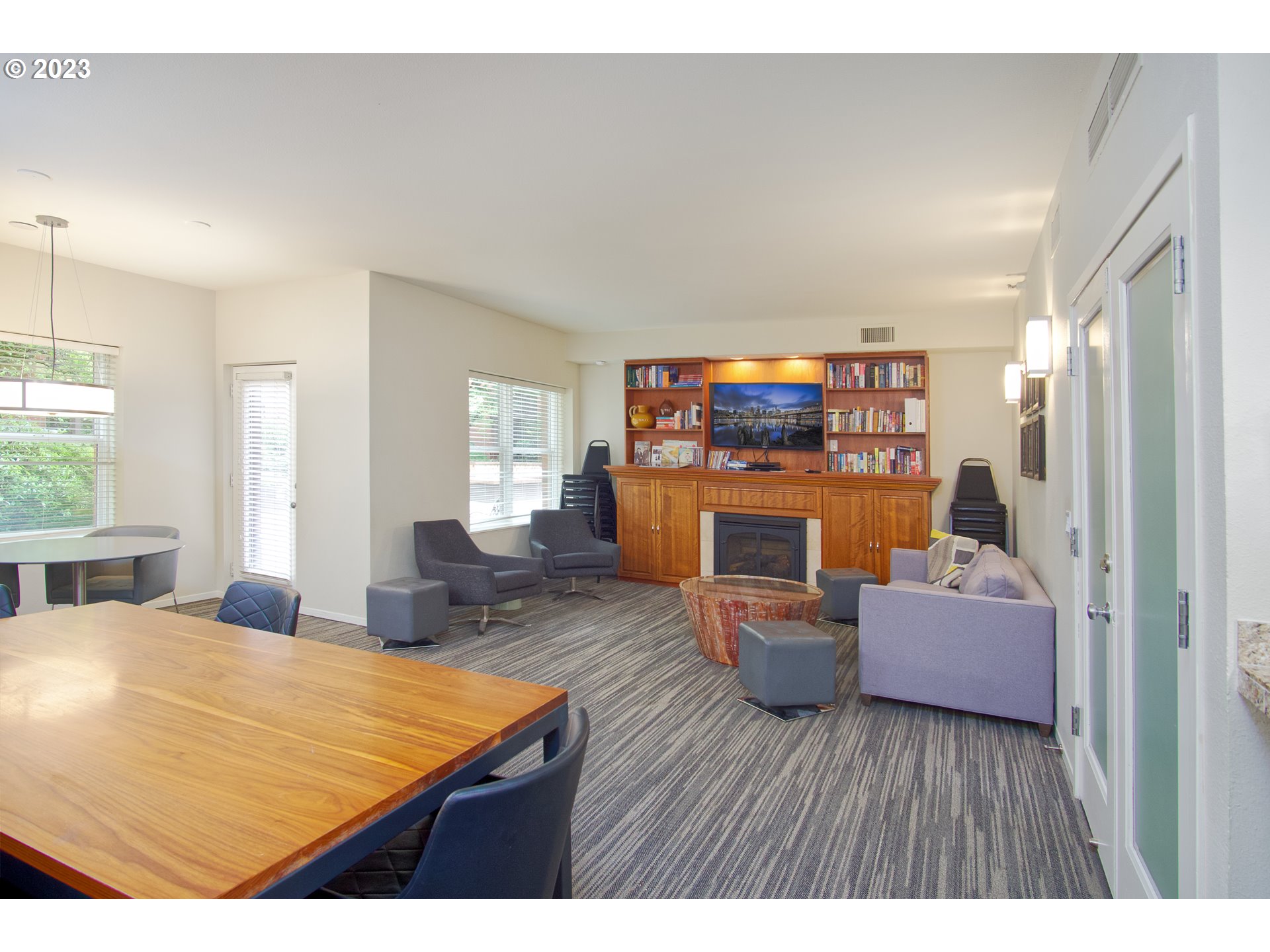 1500 Southwest Park Avenue, Unit 118 Portland, OR 97201 - Photo 17 of 30 a living room with furniture and a wooden floor