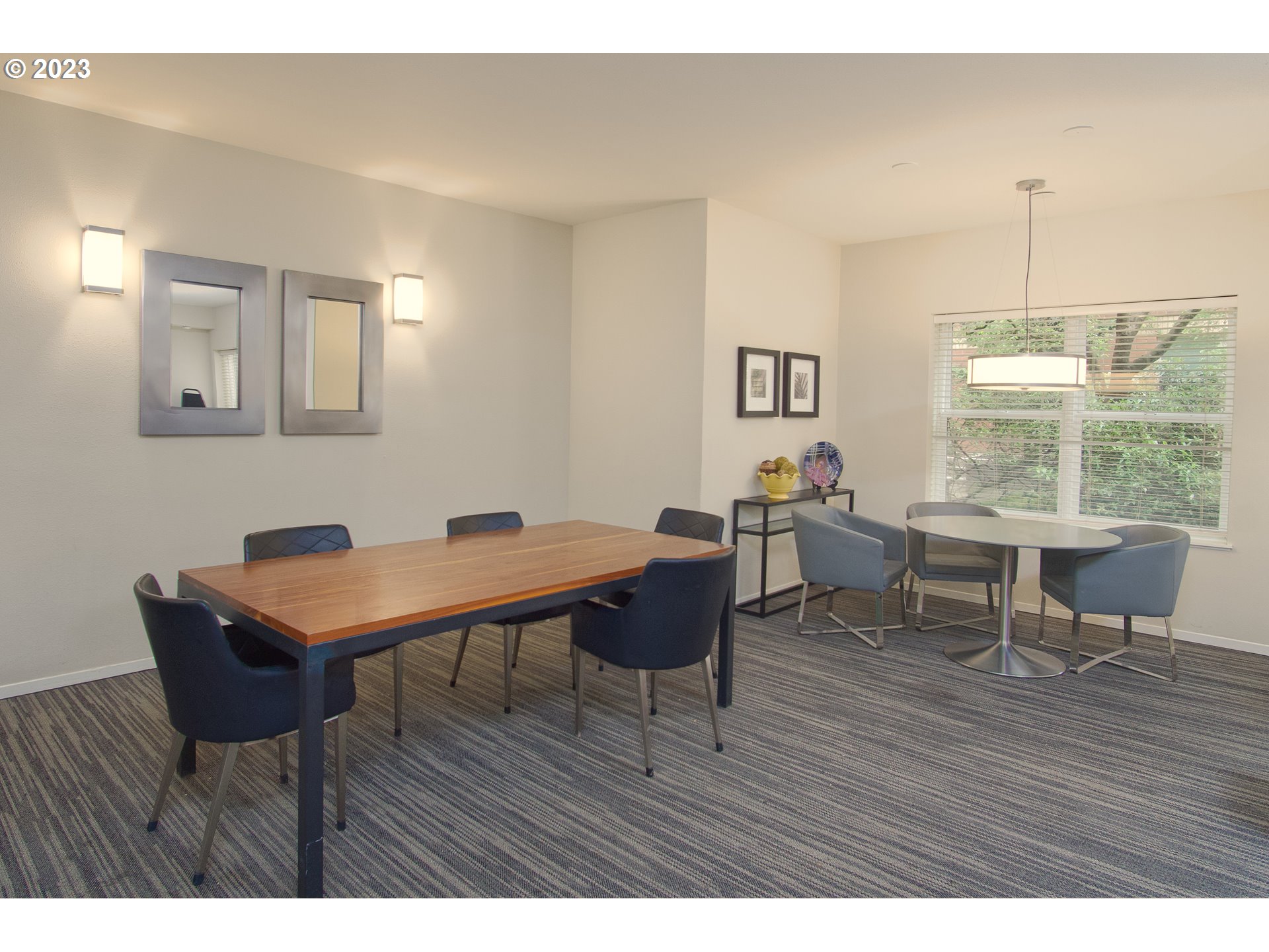 1500 Southwest Park Avenue, Unit 118 Portland, OR 97201 - Photo 18 of 30 a living room with furniture a window and a table