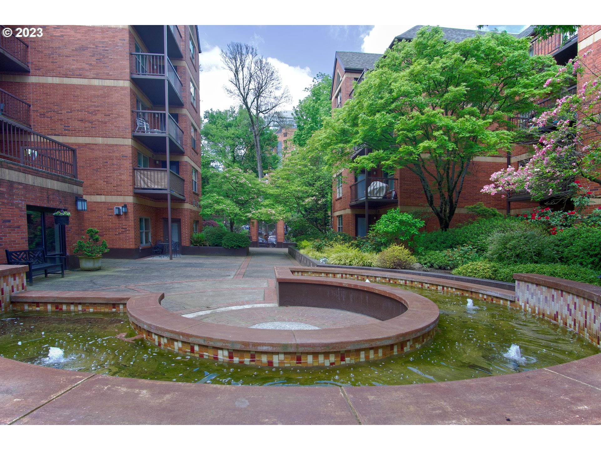 1500 Southwest Park Avenue, Unit 118 Portland, OR 97201 - Photo 27 of 30 a view of a swimming pool with a patio