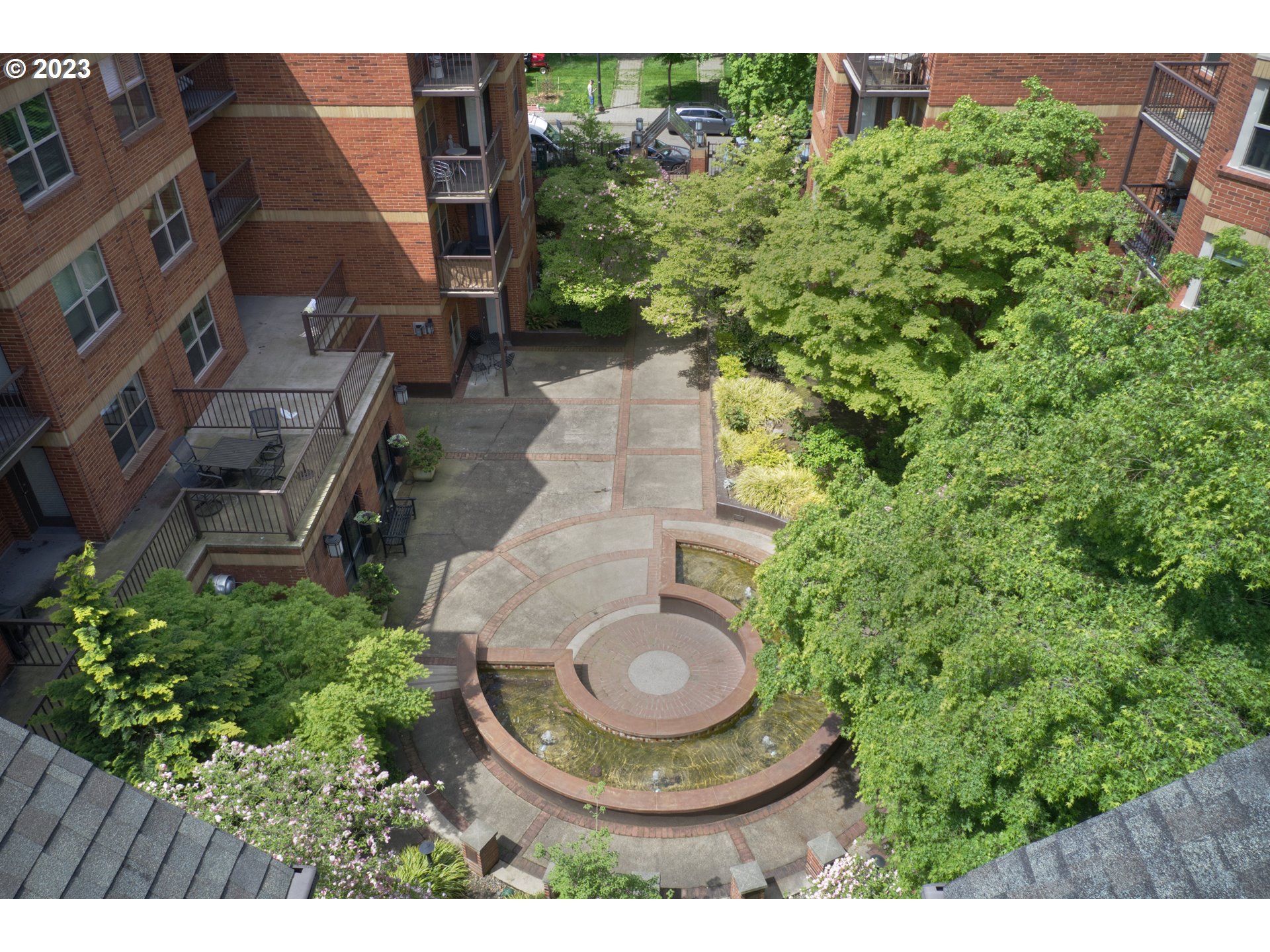1500 Southwest Park Avenue, Unit 118 Portland, OR 97201 - Photo 28 of 30 a aerial view of a house with garden space and street view