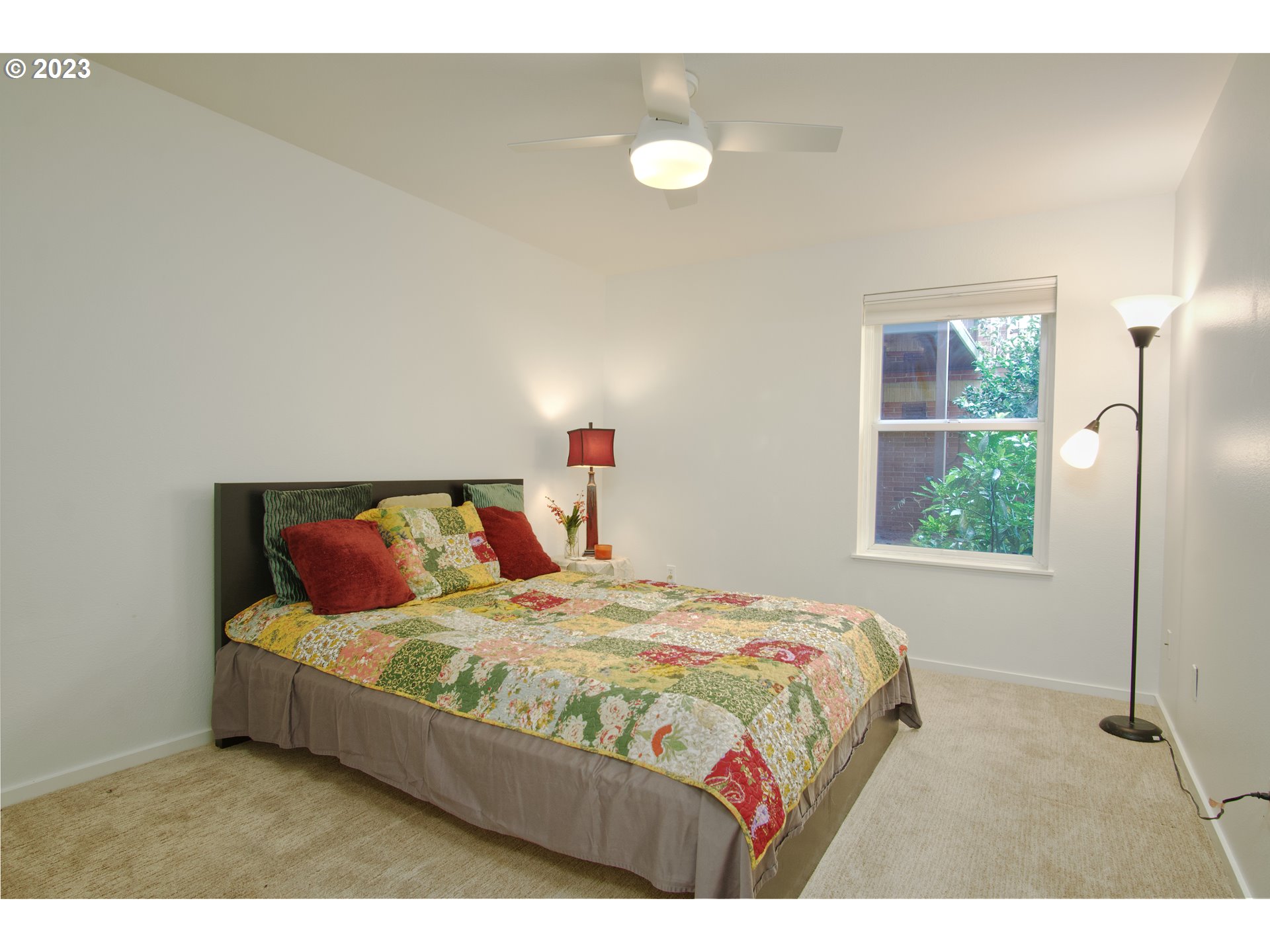 1500 Southwest Park Avenue, Unit 118 Portland, OR 97201 - Photo 9 of 30 a bedroom with a bed and window
