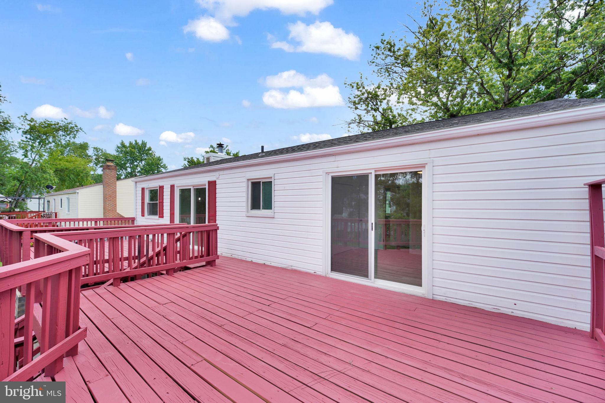 8613 Weems Road Manassas, VA 20110 - Photo 32 of 50 a view of a house with wooden deck
