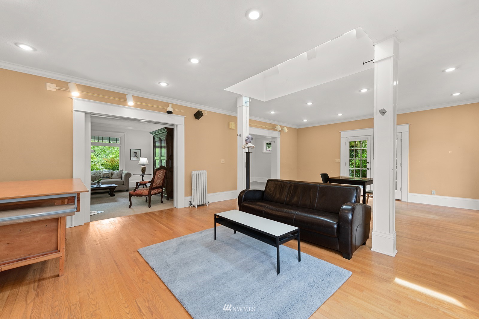 945 17th Avenue East Seattle, WA 98112 - Photo 18 of 40 a living room with furniture and a wooden floor