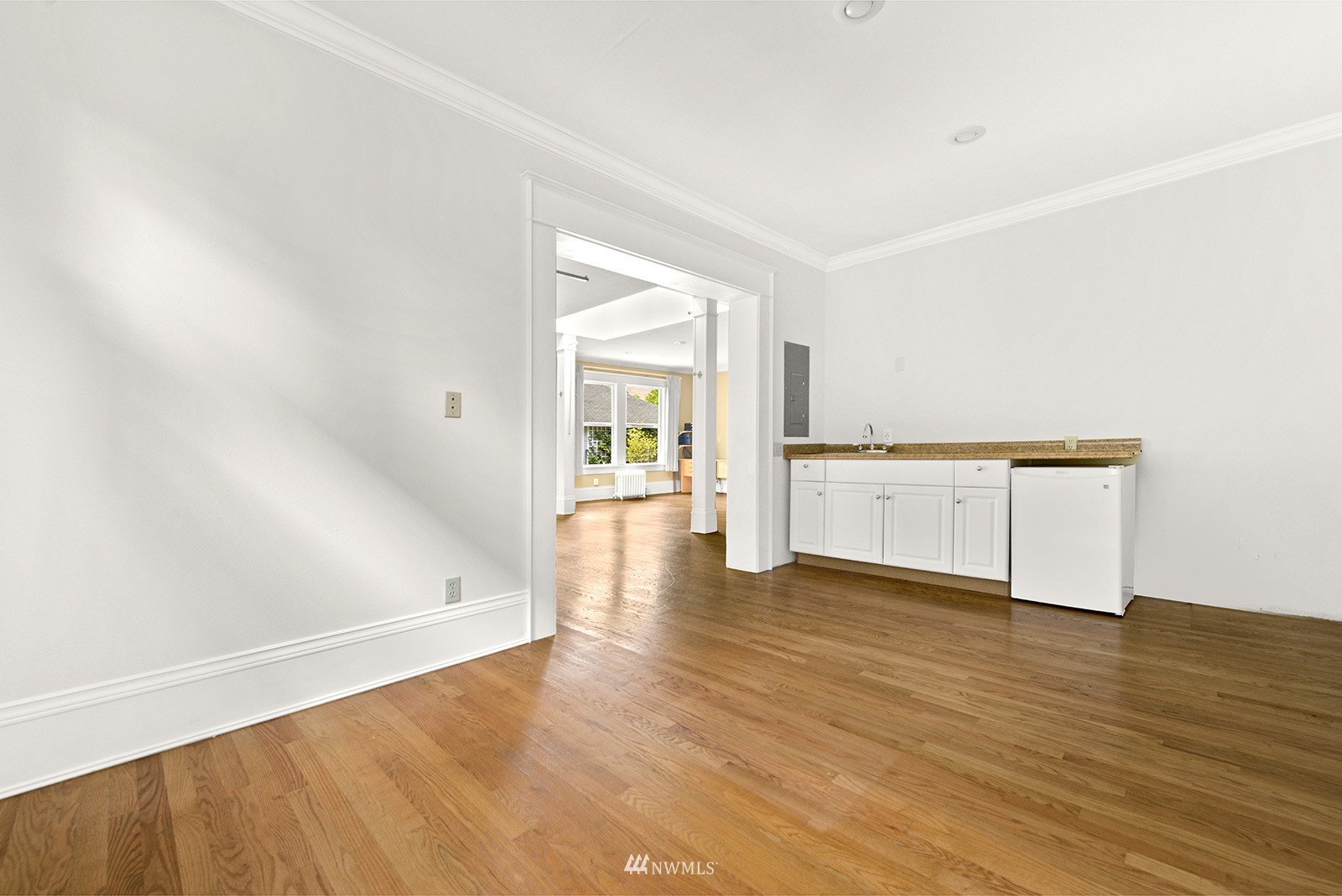 945 17th Avenue East Seattle, WA 98112 - Photo 20 of 40 a view of a kitchen with wooden floor and a sink