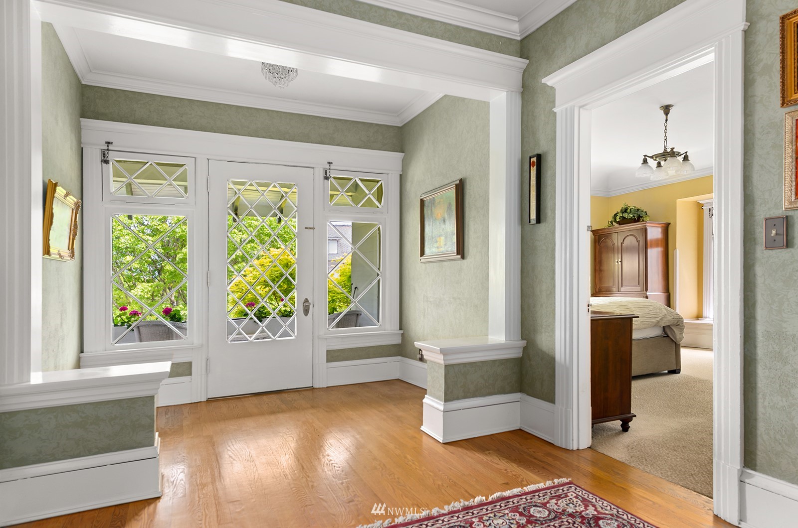945 17th Avenue East Seattle, WA 98112 - Photo 23 of 40 a view of livingroom with furniture window and front door