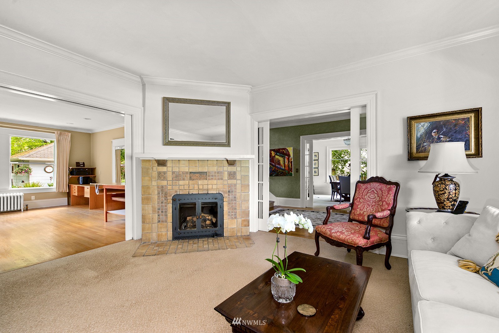 945 17th Avenue East Seattle, WA 98112 - Photo 9 of 40 a living room with furniture and a fireplace