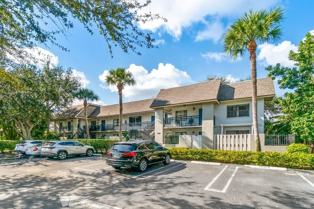a car parked in front of a house