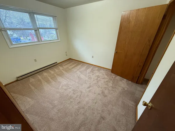 an empty room with closet