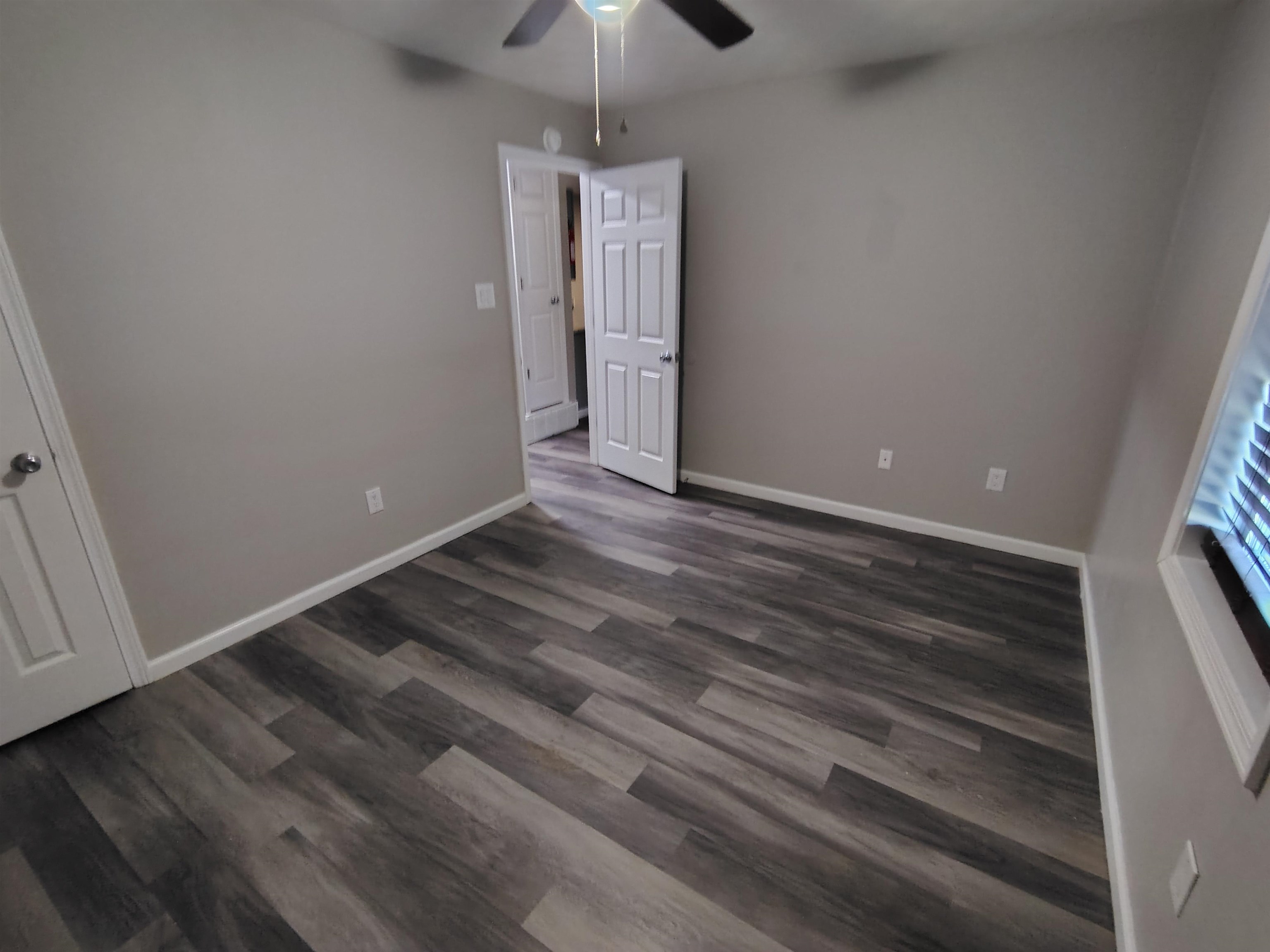 802 Pendleton Street Memphis, TN 38114 - Photo 2 of 10 a view of an empty room with a window
