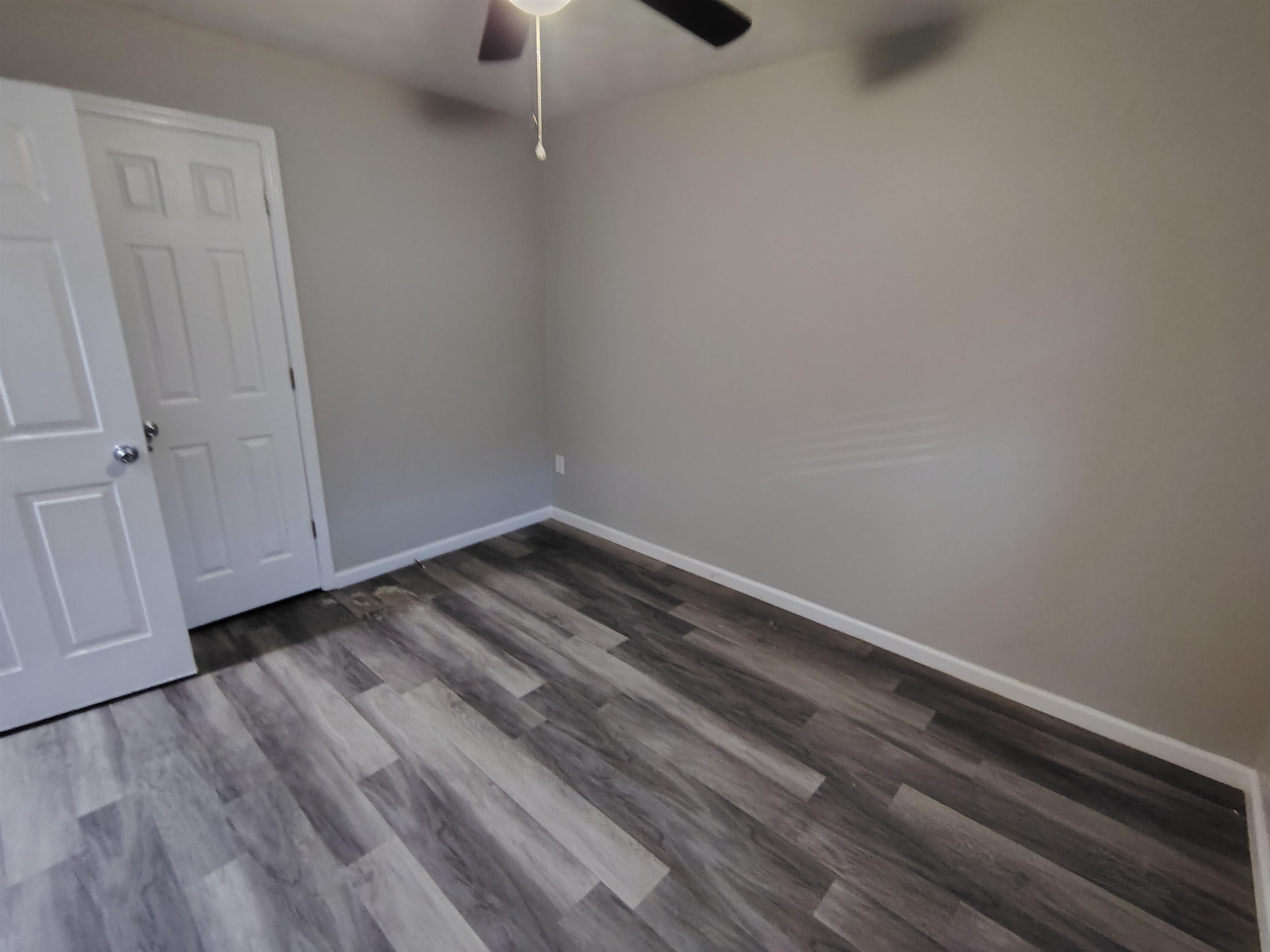 802 Pendleton Street Memphis, TN 38114 - Photo 5 of 10 a view of a room with wooden floor